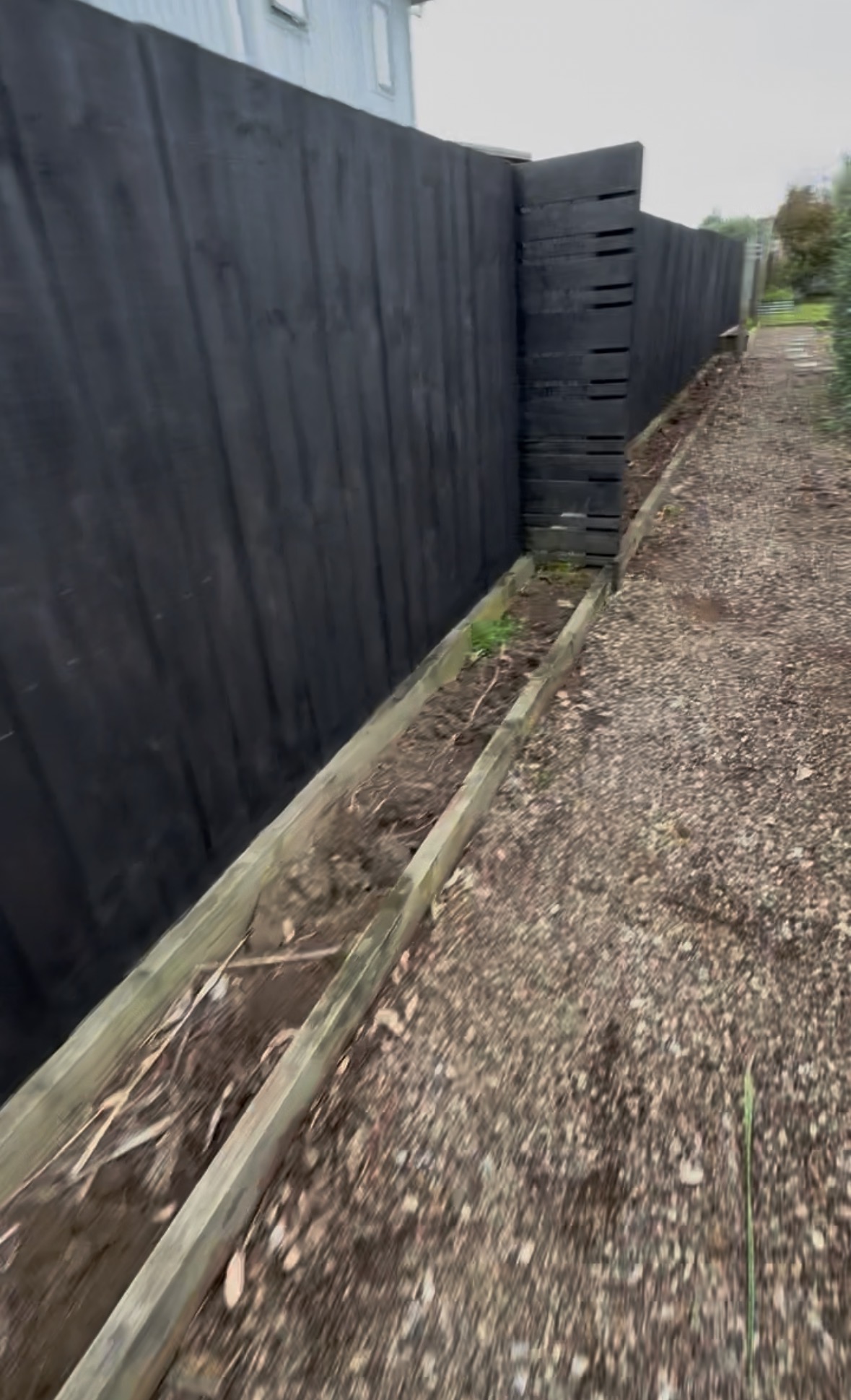 Bare side passage before transformation at 24 Nikau Rd